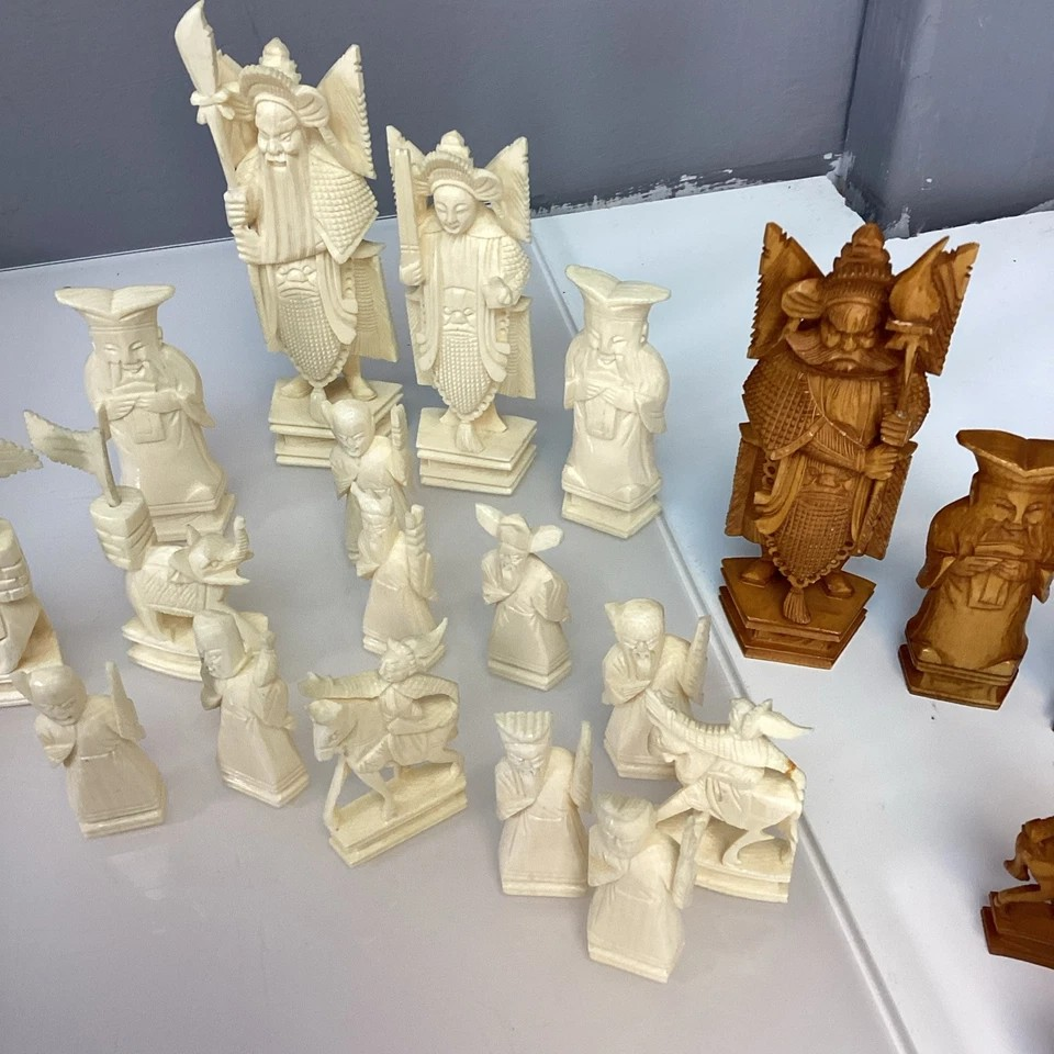 Hand Made Wooden Chess Board + Oriental Carved Chess Set Pieces displayed with intricate details and craftsmanship.
