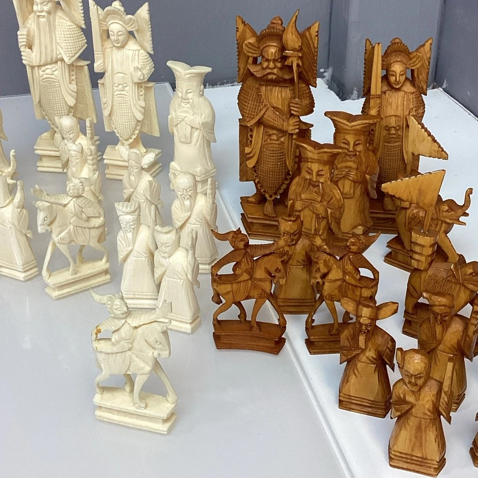 Hand Made Wooden Chess Board + Oriental Carved Chess Set Pieces featuring intricately carved chess pieces.