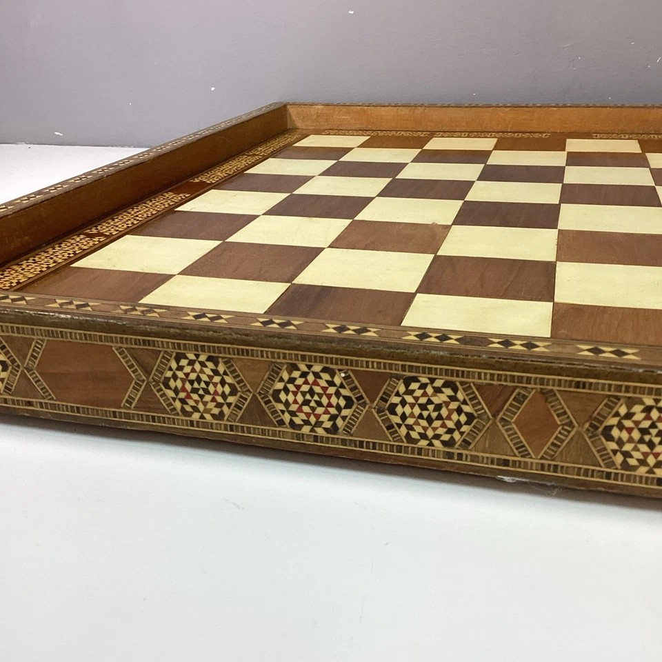 Hand Made Wooden Chess Board + Oriental Carved Chess Set Pieces featuring intricate designs and inlaid patterns.