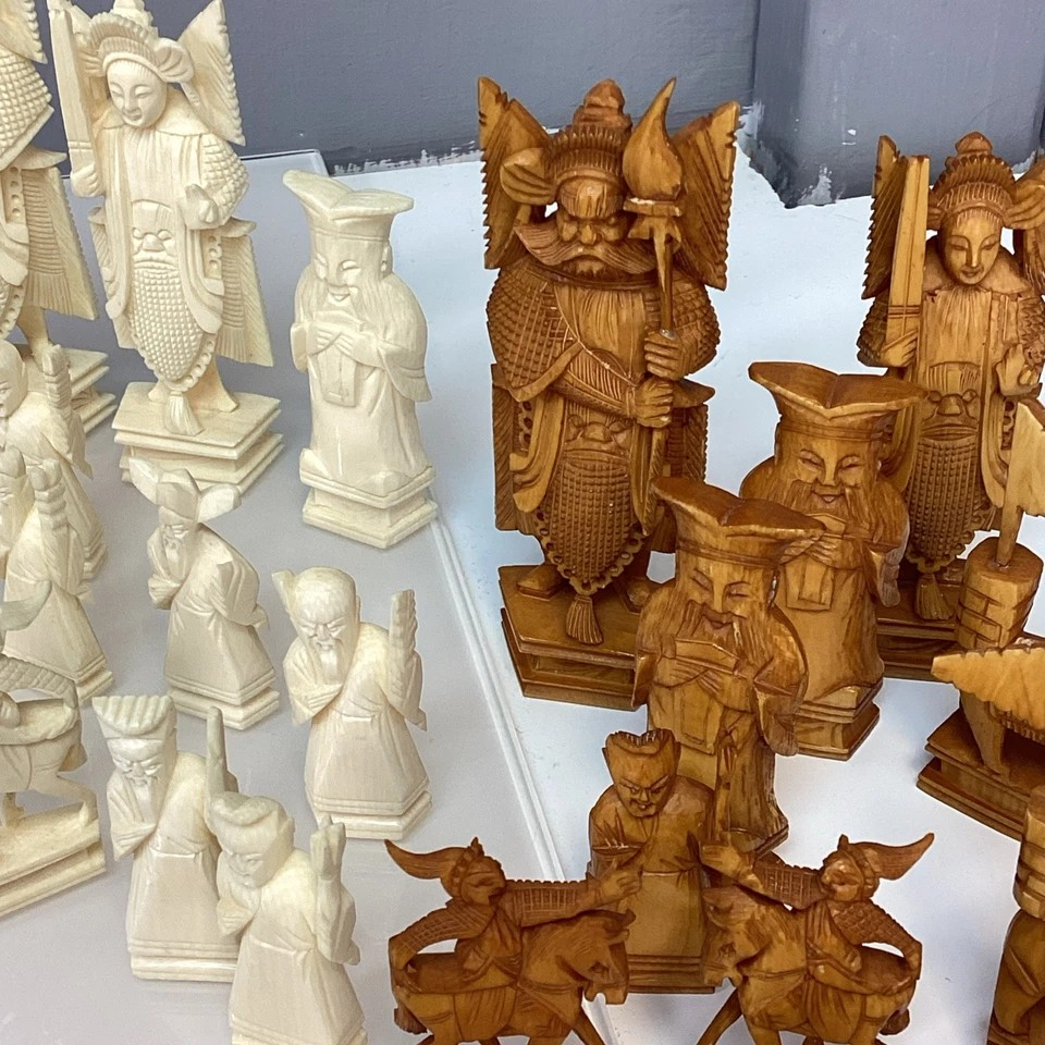Hand Made Wooden Chess Board + Oriental Carved Chess Set Pieces featuring intricately carved chess pieces.